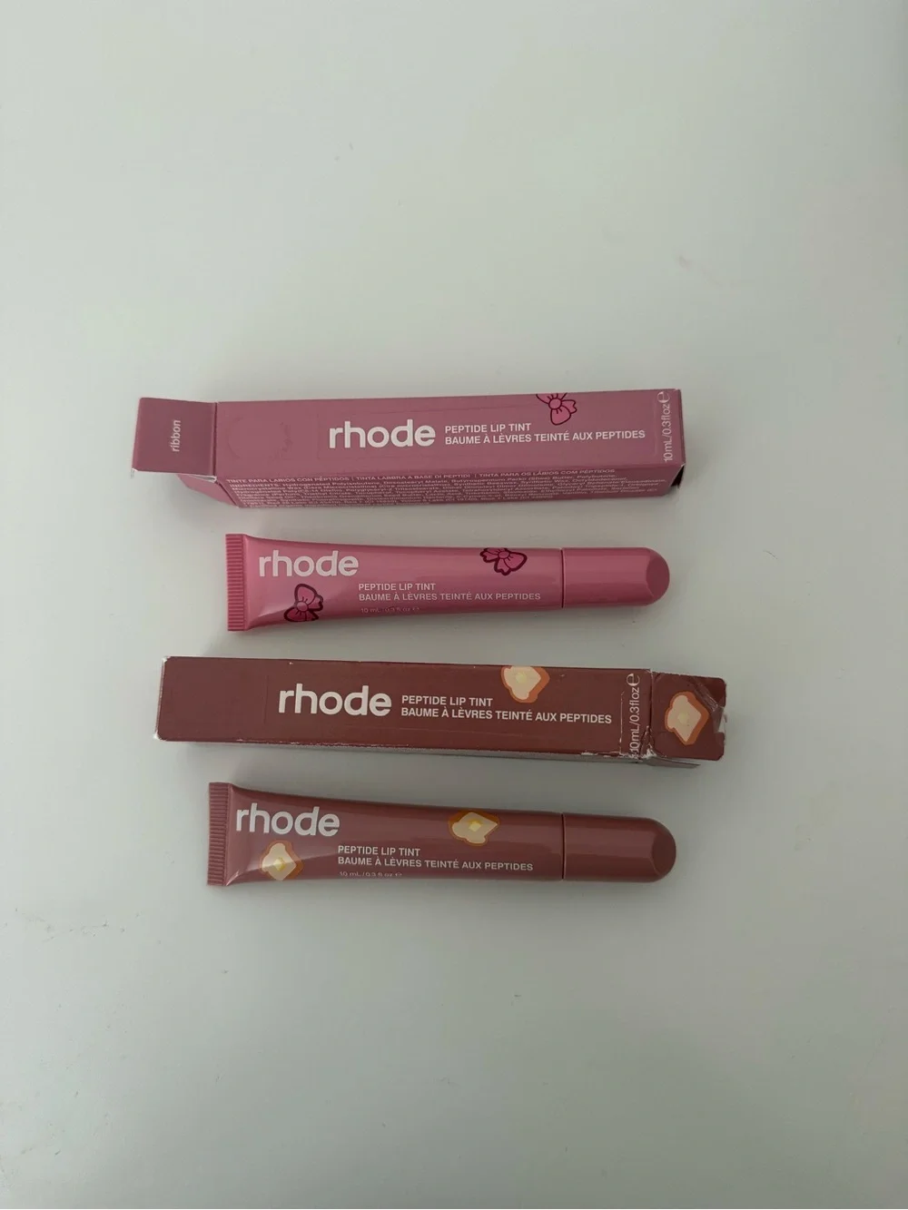 Rhode limited edition scented lip peptide treatment in toast & ribbon